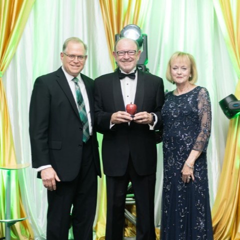 Rick Roberts (center)<br>2026 Alumnus of the Year Rick Roberts (center) Alumnus of the Year