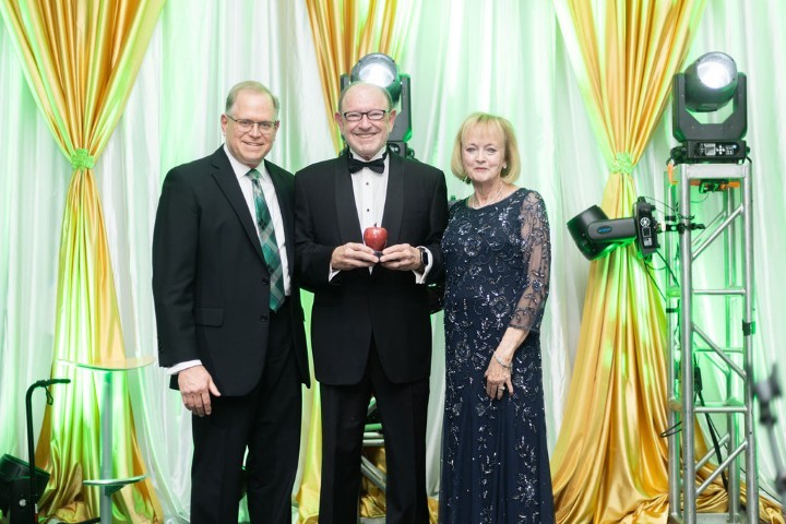 Rick Roberts (center) 2026 Alumnus of the Year